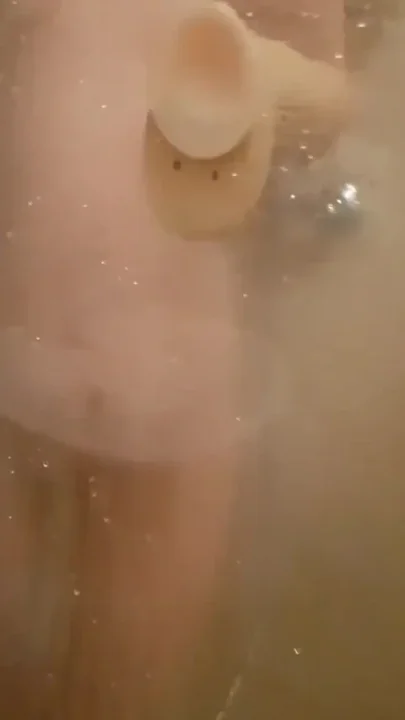 Stepdad watches as teen stepdaughter fucks in the shower with a huge dildo