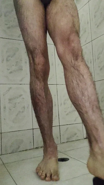 My feet in the shower rain