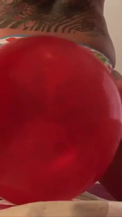 Tricia masturbating with balloons