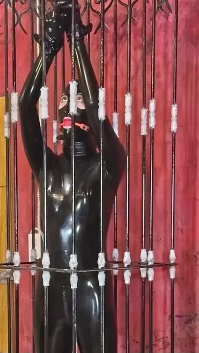 Imprisoned Rubber Slut Has to Give a Blowjob