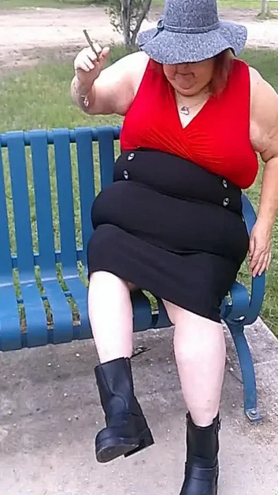 Nurse Vicki Smoking in the Park on a Bench All Dressed up