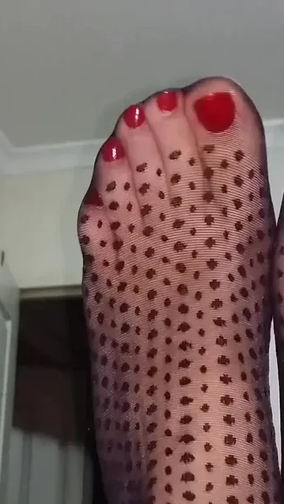 Black Dot Patterned Pantyhose and Red Toenails
