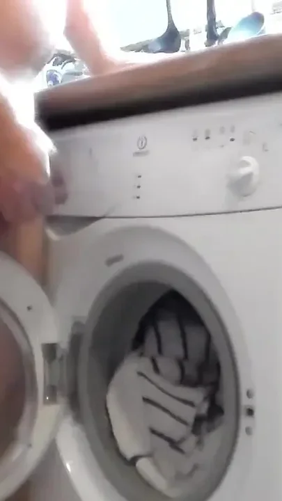 John is peeing all inside the full laundry machine