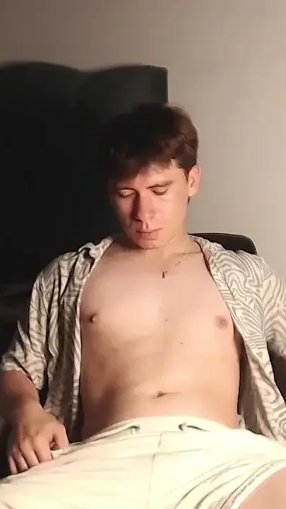 Delicious Guy Dumber Plays with His Cock Inside His Shorts and Then Takes It Out