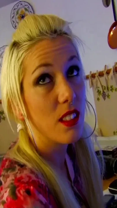 Blonde slut in a blue costume fucked in her pussy
