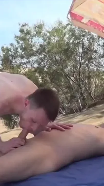 Two boys fcking bareback in the public beach