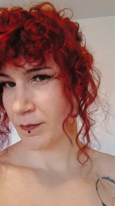 Beautiful trans redhead dommy mommy showing off her piercings