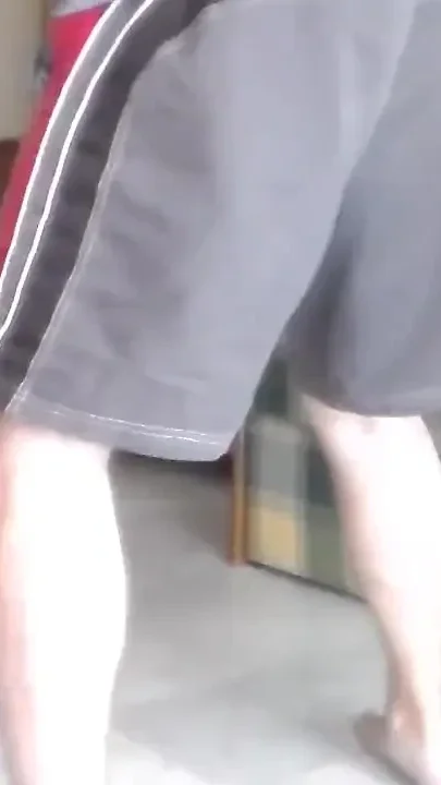 John is peeing all into his shorts