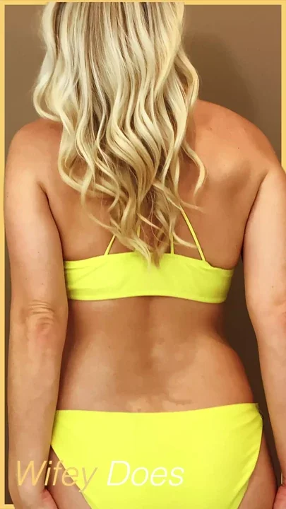 Wifey wears a skimpy yellow bikini
