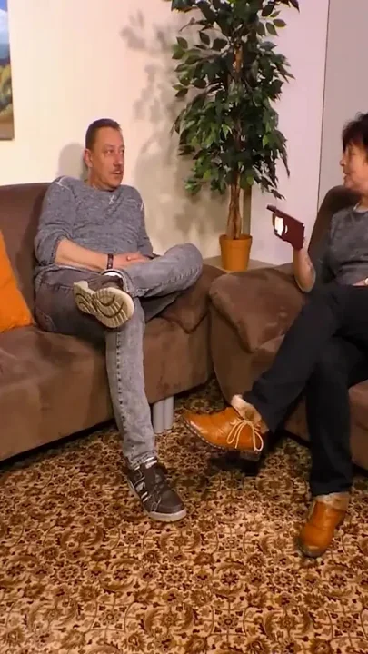 Couple does love making on the couch