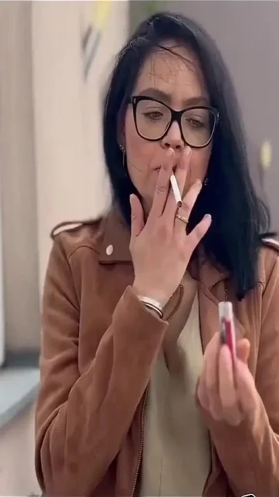 Smoking in the Rain on the Hotel Roof