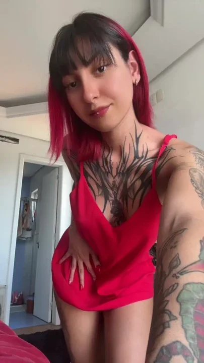 tattooed latina red dress