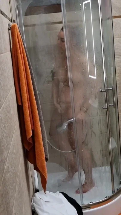 I watch my Stepmom masturbate while taking a shower Clip 1