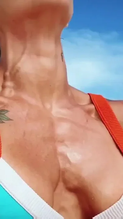 Push ups and chest flex on the beach Clip 1