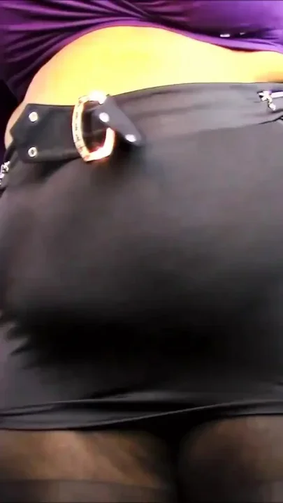 BBW black miniskirt and pantyhose tease