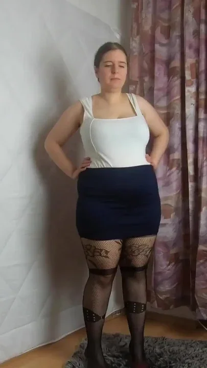 Mini skirt heels and fishnet stockings