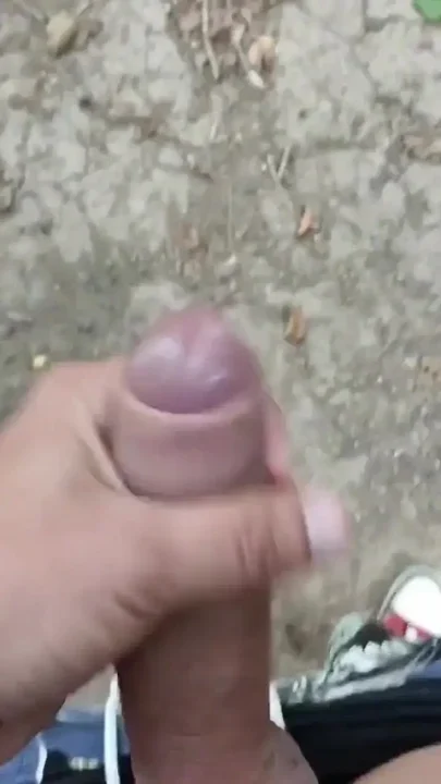 Jerk off Near Lake Close up Looks on Big Glans and Cum to Lake