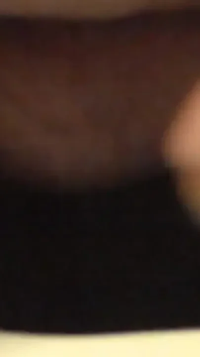 Closeup of Jen peeing into the toilet