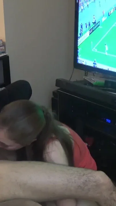 Double Blowjob While He Plays FIFA Clip 1