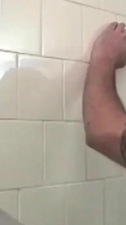 Straight boy under the shower at the sport