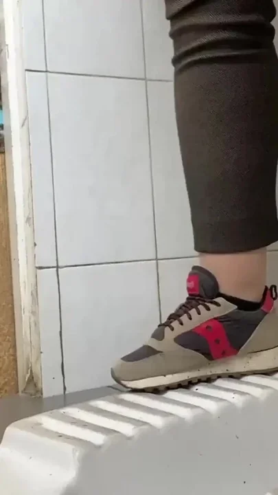 Mature MILF Pees in a Hospital Public Toilet