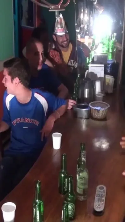 Two footballers with feet and foot humiliation in a bar