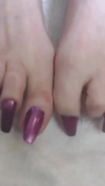 Super long metallic pink toenails