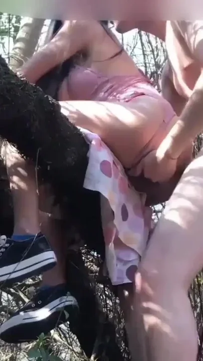 Stepsister gets trapped up top of the tree and her stepbrother helps her down