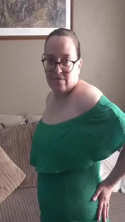 Stripping in Green Dress