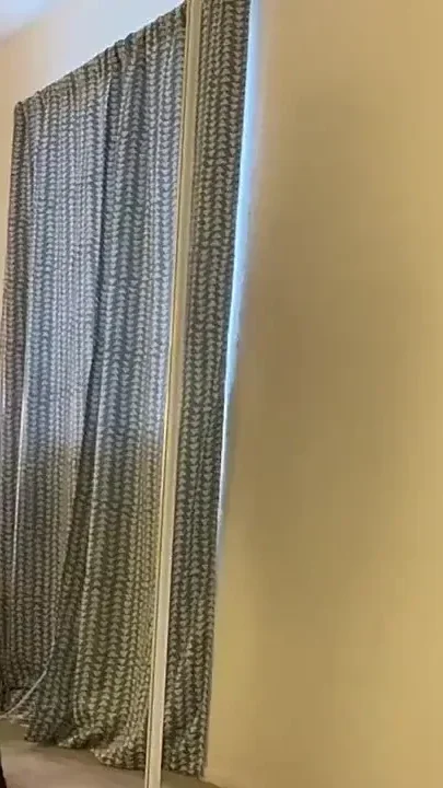 BBW Maid in Stockings Poses with Mirror