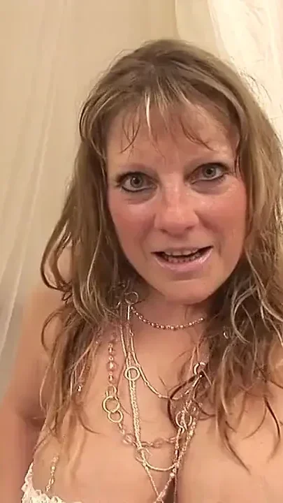 55 Year Old Cougar Enjoys a Hard Cock