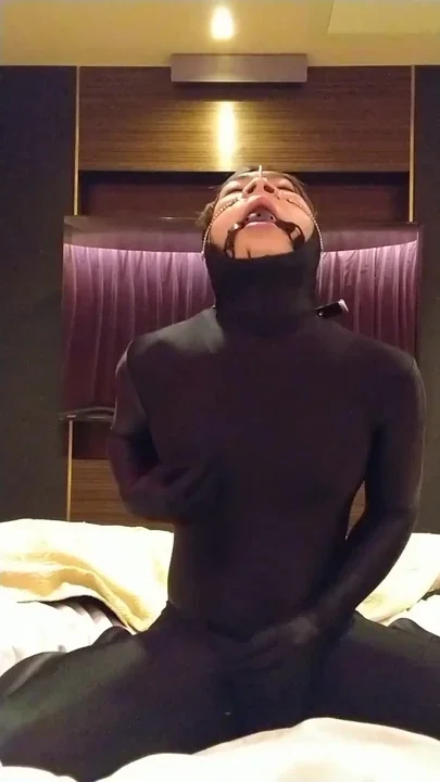 A cross-dressing boy masturbated with a collar handcuffs nose hook and ball gag
