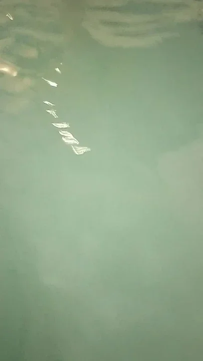 Wife playing in hotel hot tube