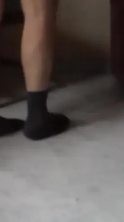 John is pissing all on the floor in the livingroom