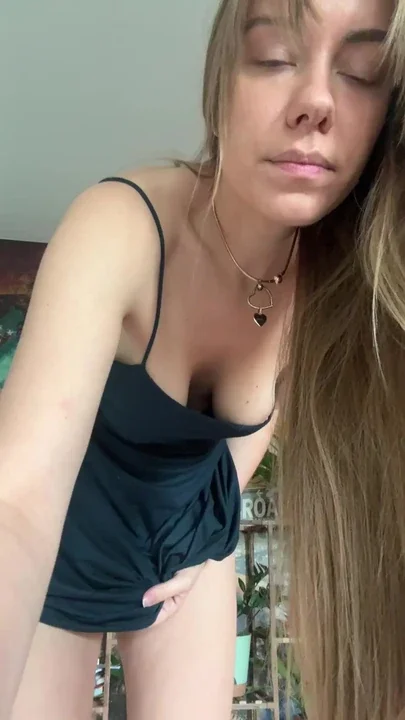 Lifting my dress for a cheeky panty tease
