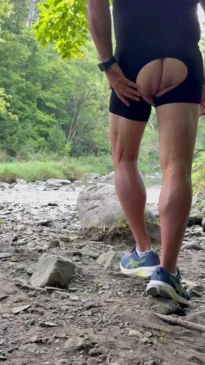Posing outdoors by a Creek