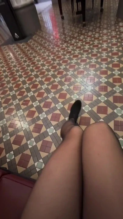 Asian femboy in black dress at a shopping centre Clip 1