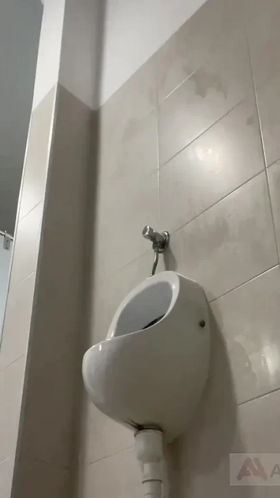 Amateur Twink Boy and Older Guy Caught Having Risky Fun in the Pool's Public Toilets