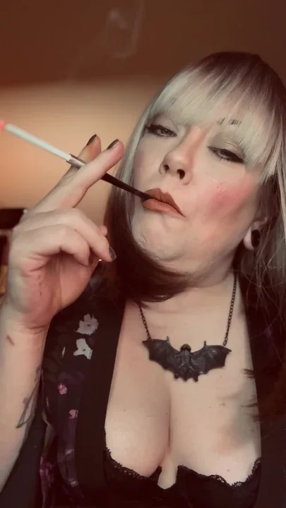 Miss Tina Snua Smokes A Slim Cigarette With A Holder - dangling Dangle Smoking