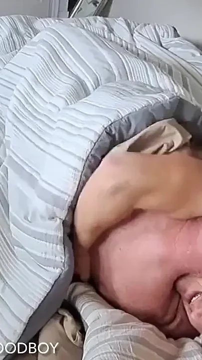 Boy Sharing Bed with Stepdad