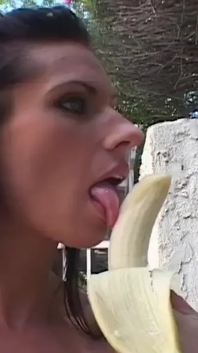 Horny girl bends over as a lesbian lover fucks her with a strap-on dildo