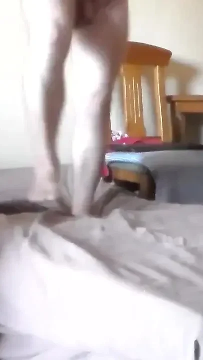 John is peeing and cumming all over the bed