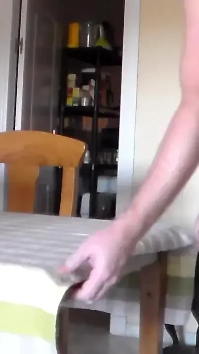 John is peeing on the table and the table cloth