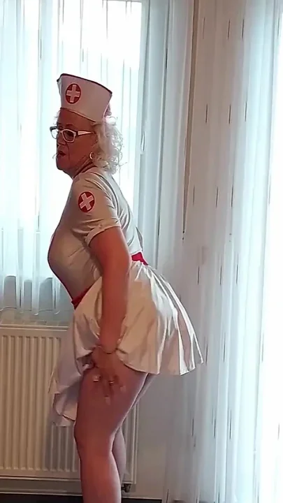 Hot Granny in Nurse Outfits Plays with Her Dildo