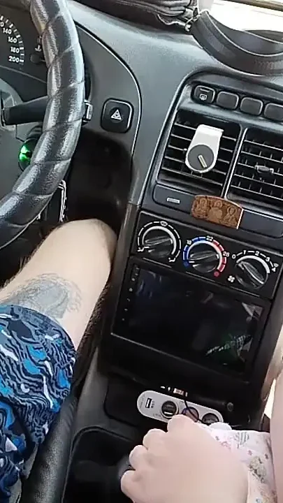 Masturbation of a Penis in a Car in the Parking Lot