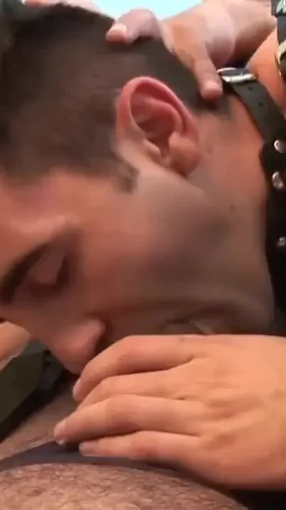 Spanked while sucking a big cock