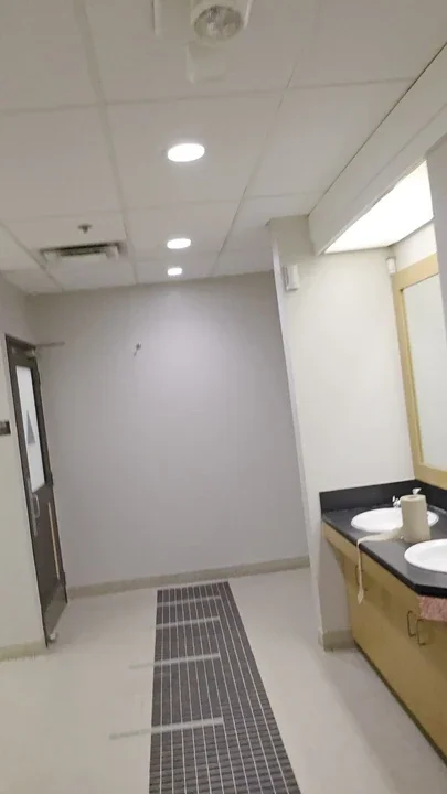 Walking around an empty public restroom before fingering my fat sissy ass I love