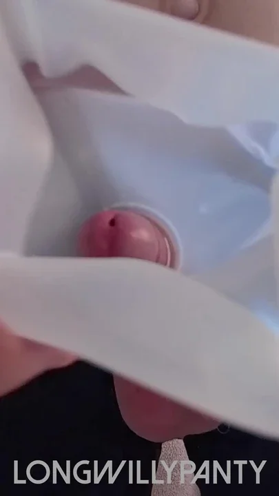 Straight guy sticks his uncut cock in a milk bottle