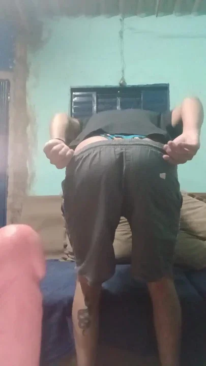 In panties showing her ass