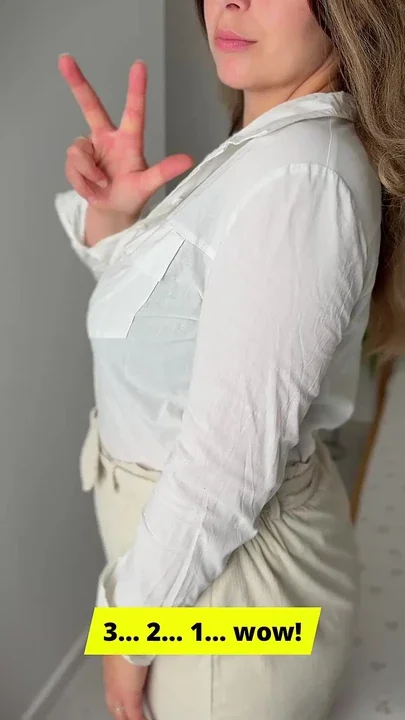 MILF in an elegant outfit shows off her cleavage